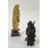 A Chinese carved soapstone figure of the Immortal Zhang Guo (h- 20cm) together with a brass/bronze