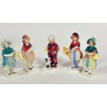 A pair of Katzhutte standing Figures, Young Girls with Umbrellas (14cm x 4cm x 4cm) and a pair of