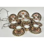 A Royal Crown Derby Imari pattern 2451 teaset comprising a set of six circular loop handled tea cups