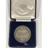 A 1912 silver presentation medal from The Department of Technology, from the City & Guild of