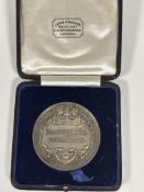 A 1912 silver presentation medal from The Department of Technology, from the City & Guild of