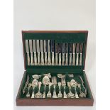 An EPNS canteen of fiddle and shell pattern cutlery for twelve covers, in a fitted mahogany case