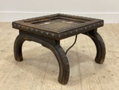 An Indian brass and iron mounted stained hardwood lamp table, H30cm, W56cm, D43cm