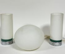 A pair of John Lewis chromium and clear glass based opaque glass column lamps, with modern fitted