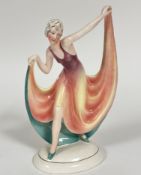 A Katzhutte large Art Deco style Dancing Figure in Evening Dress, in puce, yellow and pink with