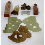 A group of Chinese carved stone items comprising three Jade carvings of mythological creatures (