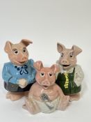 A group of three Wade pottery NatWest piggie banks including 'Lady Hilary', 'Woody', and '