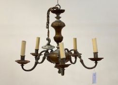 A French style silvered metal, turned walnut and copper five branch chandelier with chain and