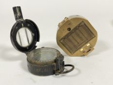 A World War Two military marching compass by T.G.Co, Ltd London, dated 1944 and stamped with British