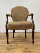 A 19th century mahogany open armchair, possibly Irish, the back seat and open arms upholstered in