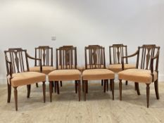 A set of eight (6+2) Georgian style walnut dining chairs, with ebonised string inlay, upholstered