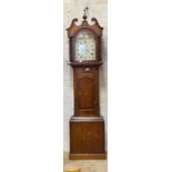 A mid 19th century mahogany and oak longcase clock, the hood with urn final and swan neck pediment