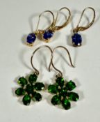 A pair of green floral style cluster gem stone earrings, the centre stone (0.2ct) with surround of