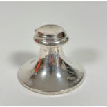 A Chester silver Capstan style inkwell with hinged top enclosing original glass liner of tapered