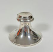 A Chester silver Capstan style inkwell with hinged top enclosing original glass liner of tapered