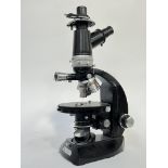 A Vickers Instruments monocular microscope made by Cooke Troughton & Simms Ltd of York (h-44.4cm w-