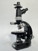 A Vickers Instruments monocular microscope made by Cooke Troughton & Simms Ltd of York (h-44.4cm w-