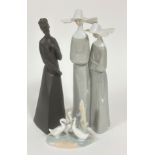 A Spanish Lladro figure group of Two Spanish Nuns (33cm x base: 13cm), a Royal Doulton Sympathy