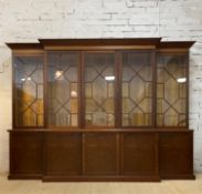 Lawrence McIntosh, A quality bespoke walnut and mahogany breakfront bookcase in the Georgian