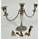 An Adam style Epns three branch candelabra with removeable drip trays, on tapered fluted column