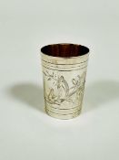 A Russian silver vodka shot glass in the Edwardian style, of tapered cylinder form, with engraved