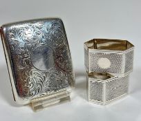 A pair of Birmingham silver octagonal engine turned napkin rings (3cm x 5cm x 3cm) (40.4g) and a