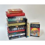 A collection of various books comprising Harry Potter and the Deathly Hallows by J.K. Rowling and