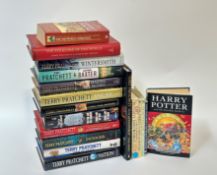 A collection of various books comprising Harry Potter and the Deathly Hallows by J.K. Rowling and