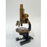 An early 20th century Leitz Wetzlar lacquered brass microscope (marked 'E.LEITZ WETZLAR' (h- 34cm)