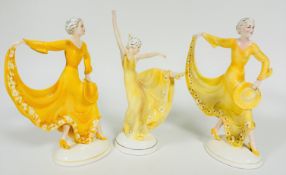 A pair of Katzhutte standing Figures, with Outstretched Arms, in summer dresses, decorated with