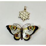 A sterling silver enamelled 1930s style butterfly brooch, with enamelled body and silver wire