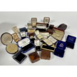 A large collection of vintage boxes including ring boxes, bracelet box, bar brooch boxes, pendant