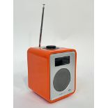 An orange Ruark Audio R1 tabletop radio with alarm function (height including aerial- 26cm, height