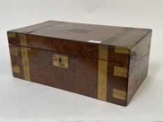 A Victorian brass bound burr walnut writing slope, the lid centred by an engraved brass cartouche,