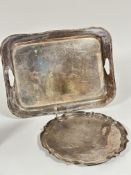 An Edwardian style shaped scalloped cast two handled tea tray with stylised Adam style cast