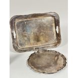 An Edwardian style shaped scalloped cast two handled tea tray with stylised Adam style cast