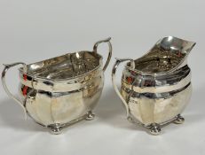 A Birmingham silver two handled panelled sugar basin (including handles: 9.5cm x 16cm x 7.5cm), on