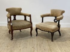 An Edwardian upholstered mahogany tub chair, the back and arms raised on three pierced splats,