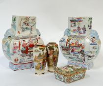 A group of Asian ceramics comprising a pair of large Chinese Hu vases with town scenes painted in