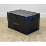 A late 19th century black japanned tin uniform trunk, the hinged lid opening to a plain interior,