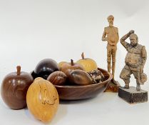 A turned Mengkulang wood fruit bowl by George James of Touch Wood Turnery (w- 19cm) containing a