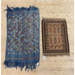 A tribal flatweave blue ground rug of geometric design 166cm x 78cm, together with another flatweave