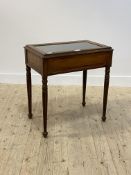 A late 19th century walnut and pine table vitrine, glazed hinged top over plain frieze, raised on