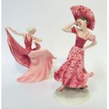 A Katzhutte Art Deco style Dancing Figure with pink and raspberry evening dress, on moulded base (