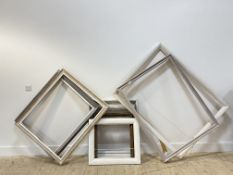 A group of eight picture frames of various sizes and designs