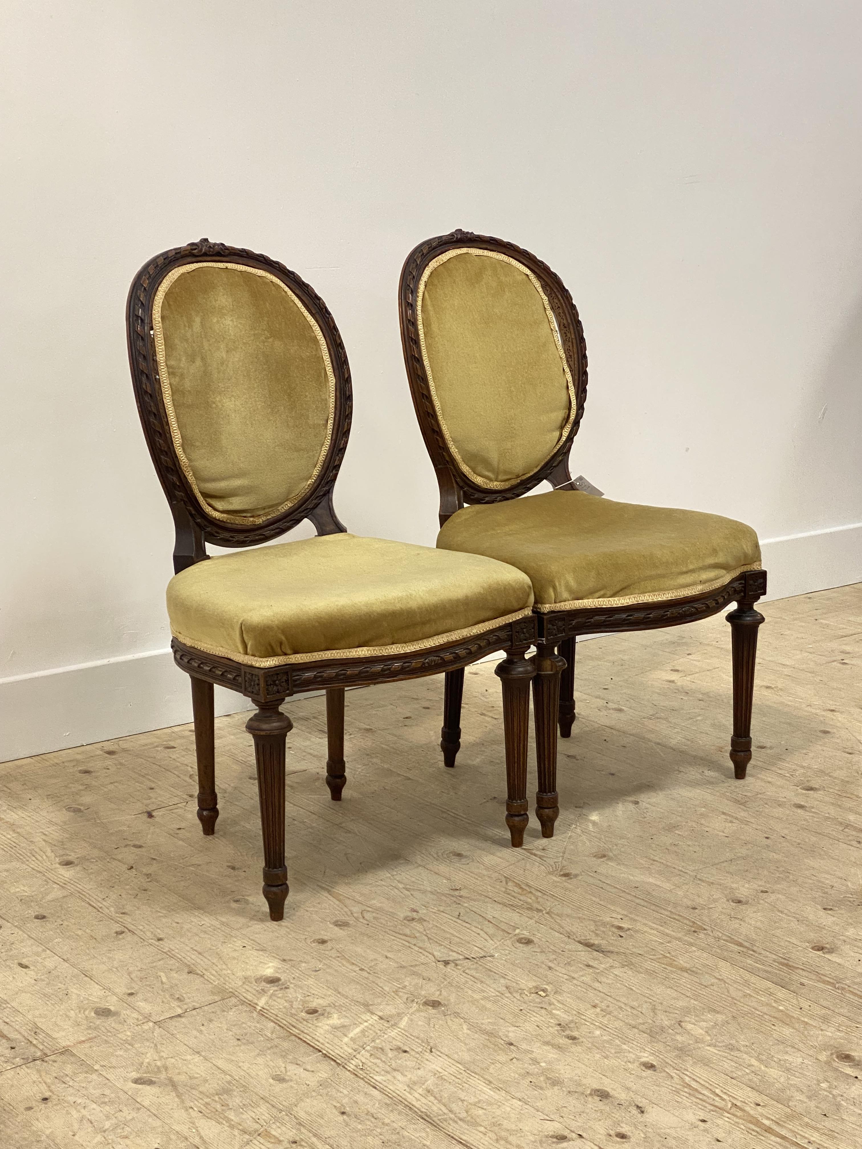 A pair of 19thc walnut side chairs, the oval back with spiral moulded show frame, over upholstered - Image 2 of 2