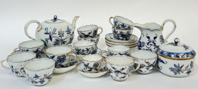 A Meissen gilt blue and white part tea service comprising a teapot (h- 15cm, w- 25cm), milk jug,