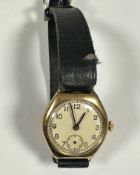 A Swiss made Stolkall British made 9ct gold wrist watch with Chester silver marks, enamelled dial