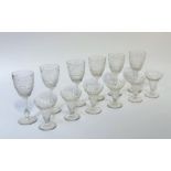A partial suite of cut and etched glass stemware, early 20th century, comprising six red wine