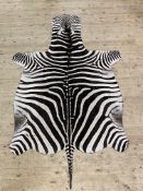 Taxidermy, A Grant's Zebra skin rug. 278cm x 170cm.